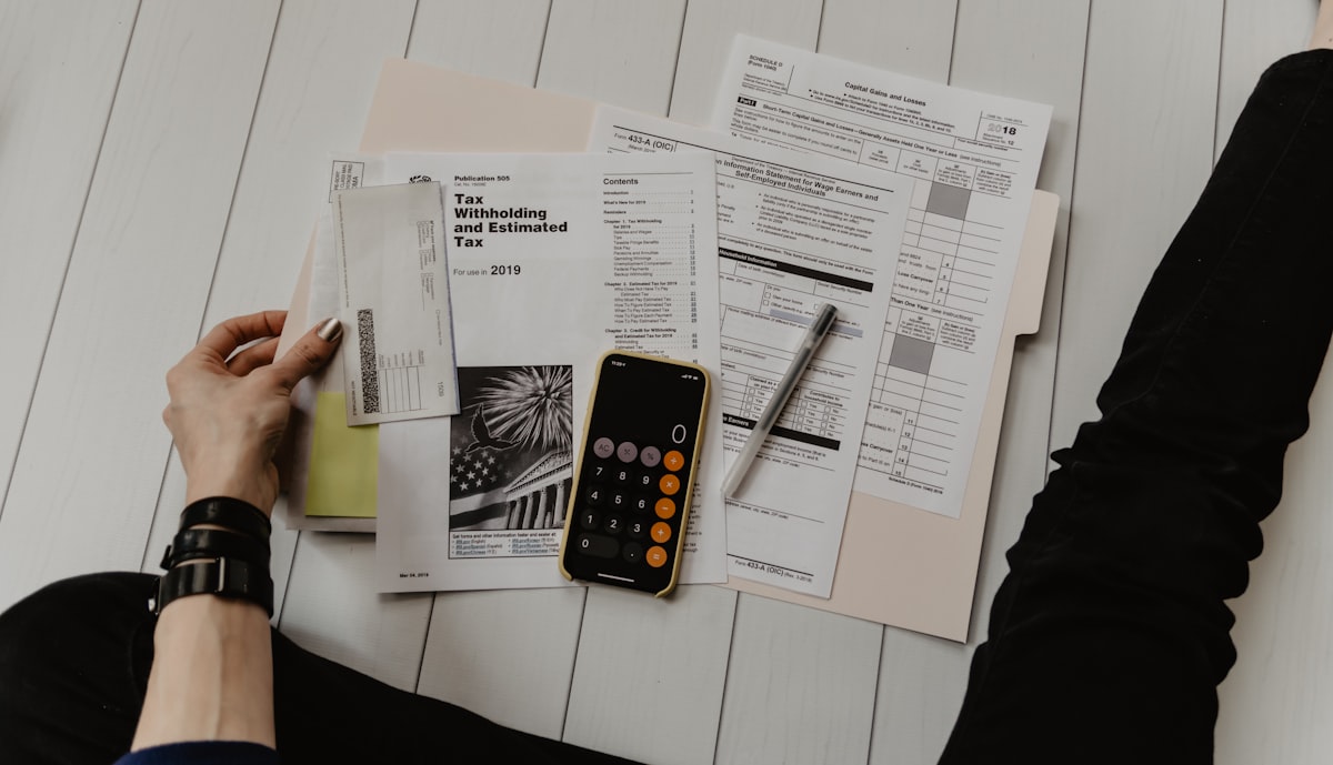 CPA reviewing financial documents for a self-employed mortgage client